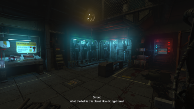 A screenshot from the game SOMA. A dark industrial room with equipment hanging on the walls. There are unknown stains on the floor. The subtitle reads: "Simon: What the hell is this place? How did I get here?"